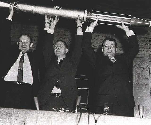 William Pickering, James Van Allen, and Wernher von Braun holding a model of Explorer 1